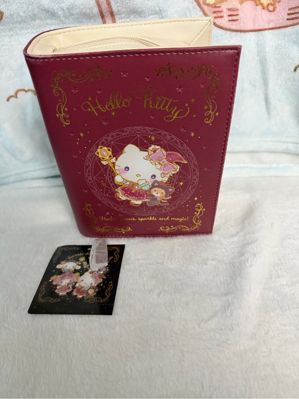 Hello Kitty cosmetic bag that looks like an actual book adorable:)